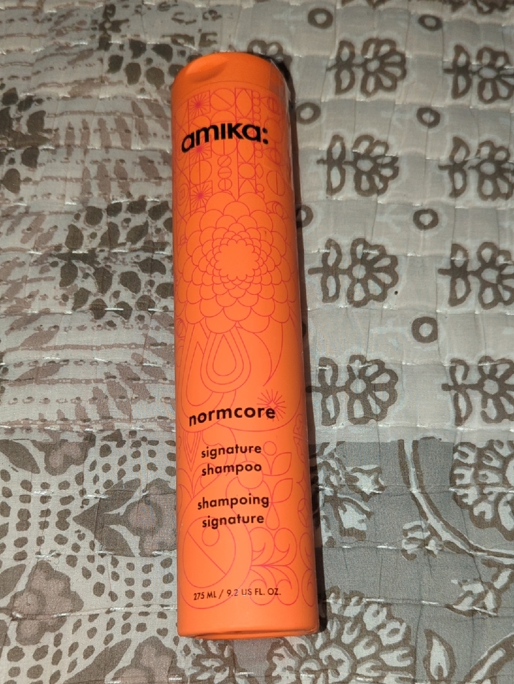 amika normcore Signature Shampoo - Vibrant Orange Bottle